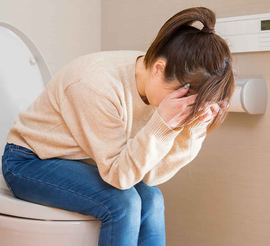 トイレでいきむと頭痛